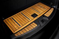 Larte design - "teak wood" interior for the Infiniti QX80