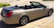 Aucun faux - 4-door Nissan Maxima convertible à vendre