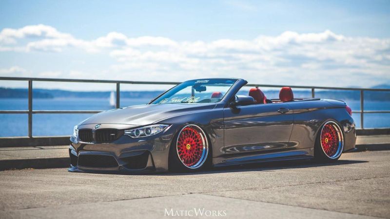 BMW M4 F82 convertible on red Avant Guard F140 alloy wheels