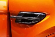 طقم هيكل الكربون في سيارة Bentley Bentayga SUV من Tuning Empire