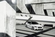 BMW F10 550i z kółkami Airride i 20 cali Ferrada FR4