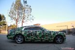Bape-camouflagepatroon op de Rolls Royce Wraith van Impressive Wrap