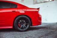 Rohana Wheels RF2 rims on the bright red Dodge Charger
