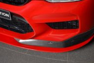 قطع غيار شنيتزر في مسابقة BMW M5 (F90) باللون الأحمر إيمولا