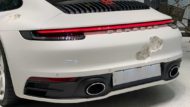 Carrozza d'arte Porsche 911 (992) rosicchiata di Daniel Arsham