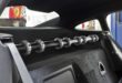 Amortiguador de cinturón: sujeción segura de los cinturones deportivos en el vehículo.