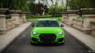 Audi RS4 verde neon con alluminio da 20 pollici e regolazione dell'assetto.