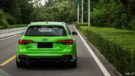 Audi RS4 verde neon con alluminio da 20 pollici e regolazione dell'assetto.