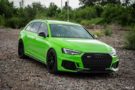 Neon green Audi RS4 with 20-inch aluminum and stance tuning.