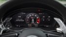 Neongrüner Audi RS4 mit 20-Zoll-Alus und Stance-Tuning.