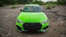 Audi RS4 verde neón con aluminio de 20 pulgadas y ajuste de postura.