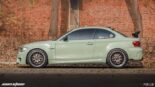 Lime green BMW 1er M Coupé (E82) with 420 PS, race optics & BBS rims.