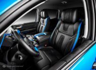 Toyota Tundra in Voodoo Blue with Carlex Design interior!