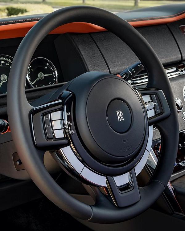 Rolls-Royce Cullinan unique item with patent leather dress in Dusty Coral!