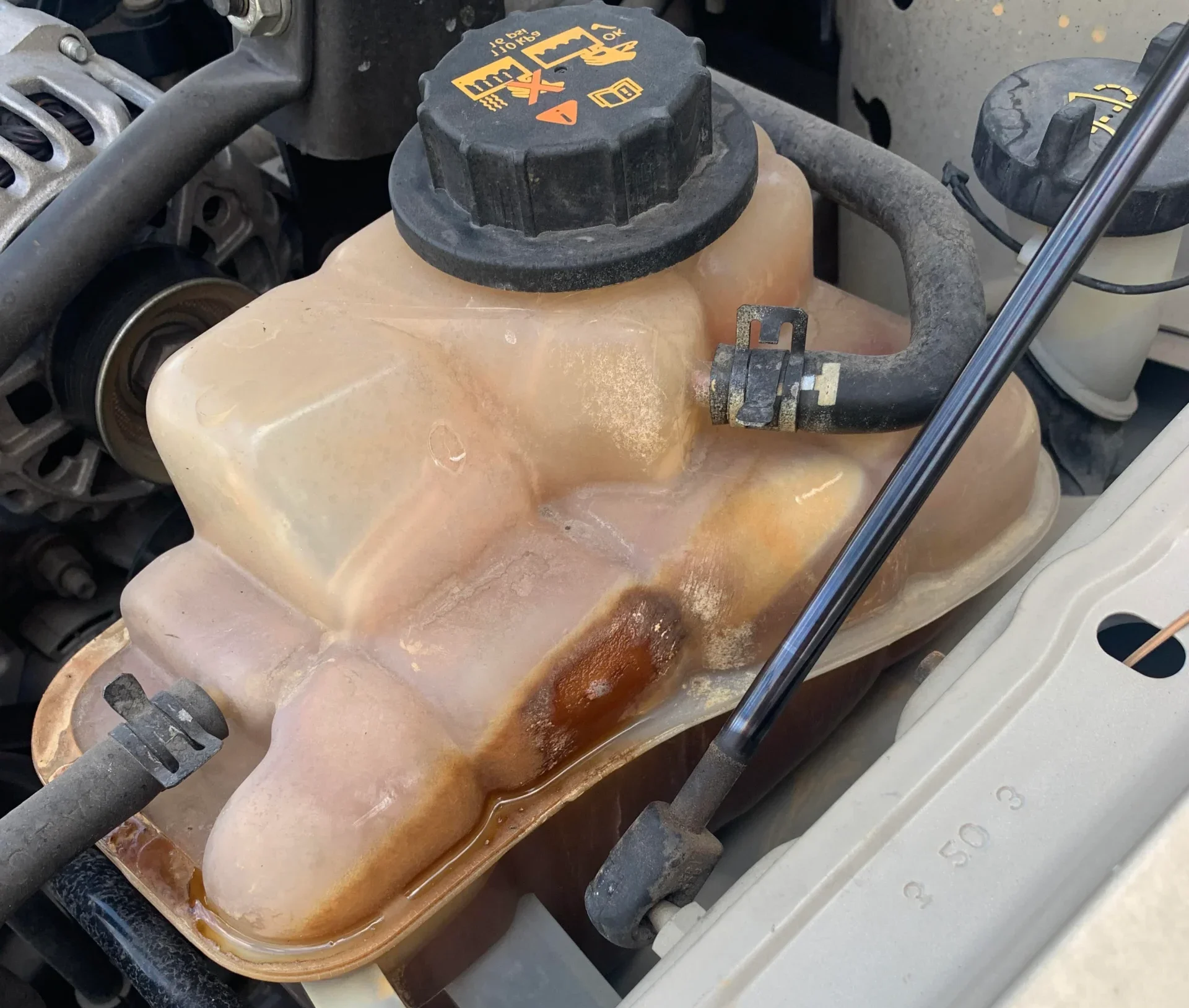 What is the purpose of an expansion tank in a car?